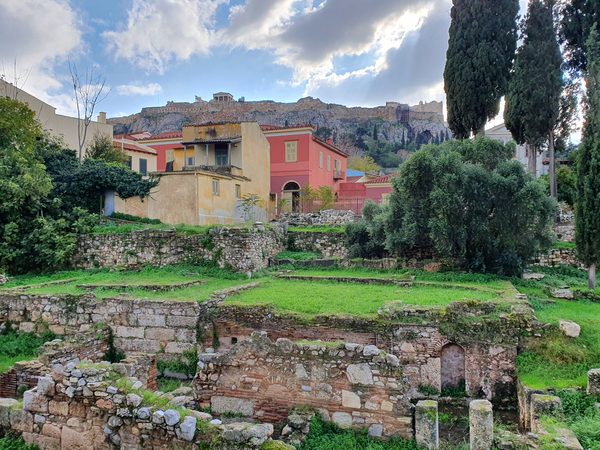 Winter clouds over the Acropolis and Plaka rooftops seen from the Roman Agora ruins